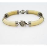 Victorian ivory bracelet with Chinese silver mounts and clasp
