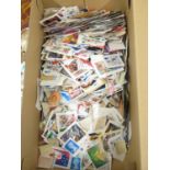2x boxes containing over 10,000 World stamps