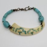 Turquoise beads with Wild Boar tusk and turquoise inserts