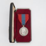 Boxed Imperial Service medal to Ronald Henry Lang