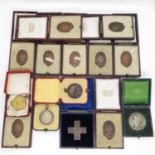 Collection of boxed medals, some silver