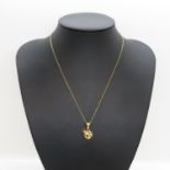 Ruby, sapphire and emerald beetle pendant on chain both in 9ct gold 2.7g
