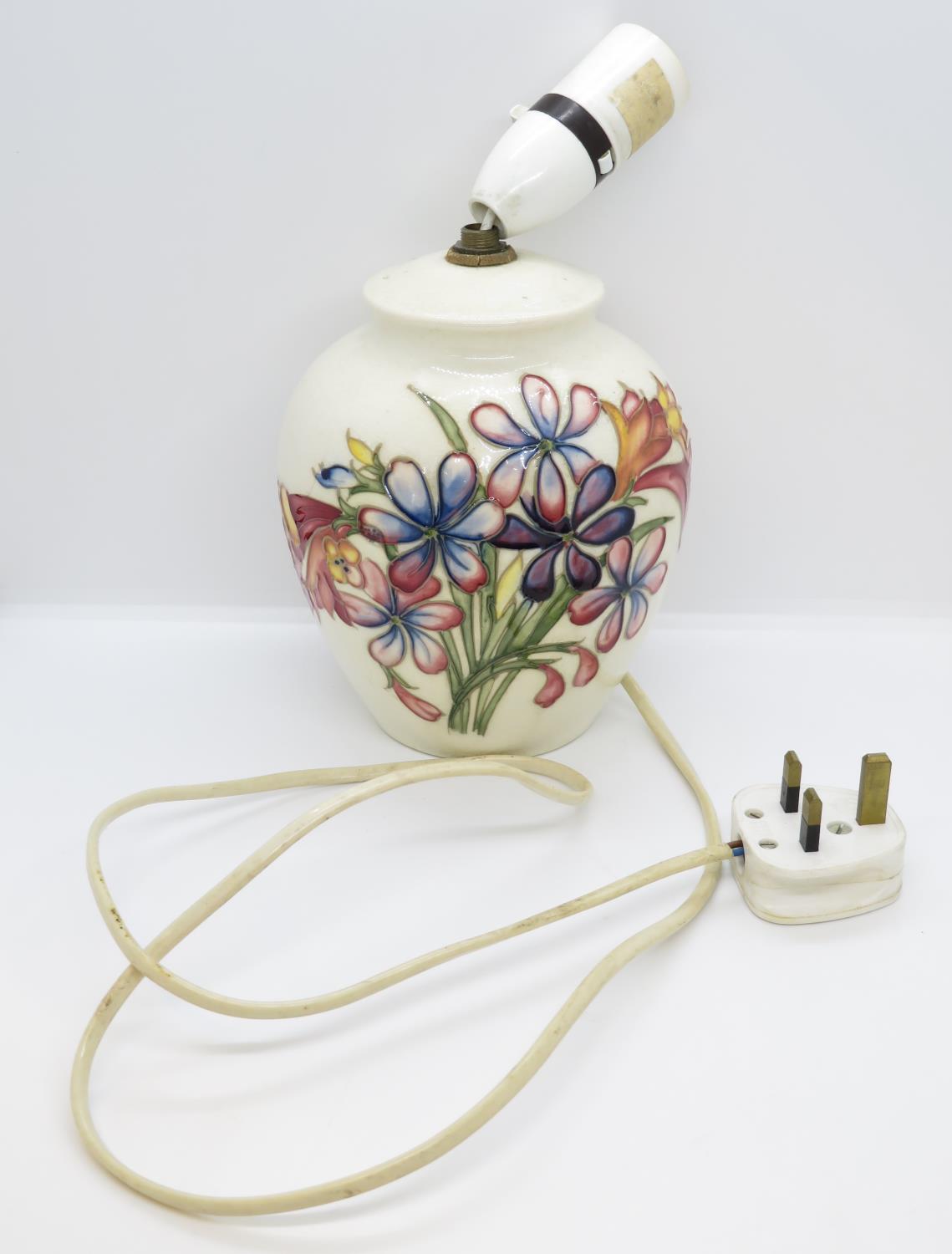 Early Moorcroft lamp with large crack from base up