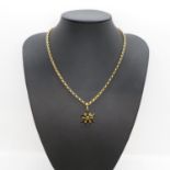 Gold and citrine pendant on gold chain 17.9cm