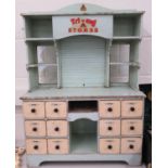 Tri-Ang early 33" high x 23" wide children's stores with drawers and roller shutter front