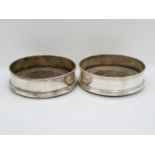 Pair of 5" HM silver wine bottle coasters