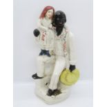 Pair of Staffordshire flatback Uncle Tom figures 10" high