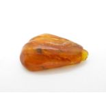 Large amber bead 50mm long 7.6g - amber contains trapped insect