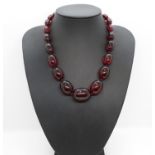 Set of large cherry amber beads 18" long 56g