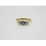 18ct diamond ring central blue stone size M