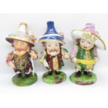 3x Mansion House Dwarves by Royal Crown Derby 2x early design, one with blue hat and one with pink