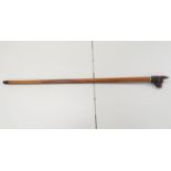 Malaca cane with carved dog head handle with glass eyes