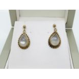Pair of rose gold set moonstone earrings