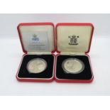 2x Royal Mint silver proof coins in boxes