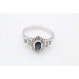 9ct white gols sapphire & diamond halo ring (3.3g) Size R