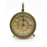 Marked working brass mantle clock 2" dial - runs but needs attention