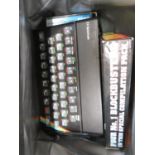 Sinclair zx spectrum with a large bag of games, approx. 20