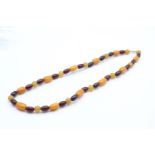 9ct gold clasp vintage amber & bakelite necklace (41g)