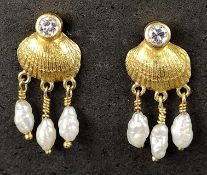 Pair of nautical stud earrings, very fine goldsmith work with three small river pearl pendants and 