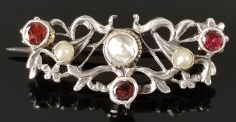 Brooch set with mother-of-pearl, seed pearls and garnets, floral motifs with small leaves, silver