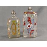 Zwei Schnapsflaschen, aus mundgeblasenem Glas mit polychromer Emailmalerei, eine mit floralem Dekor