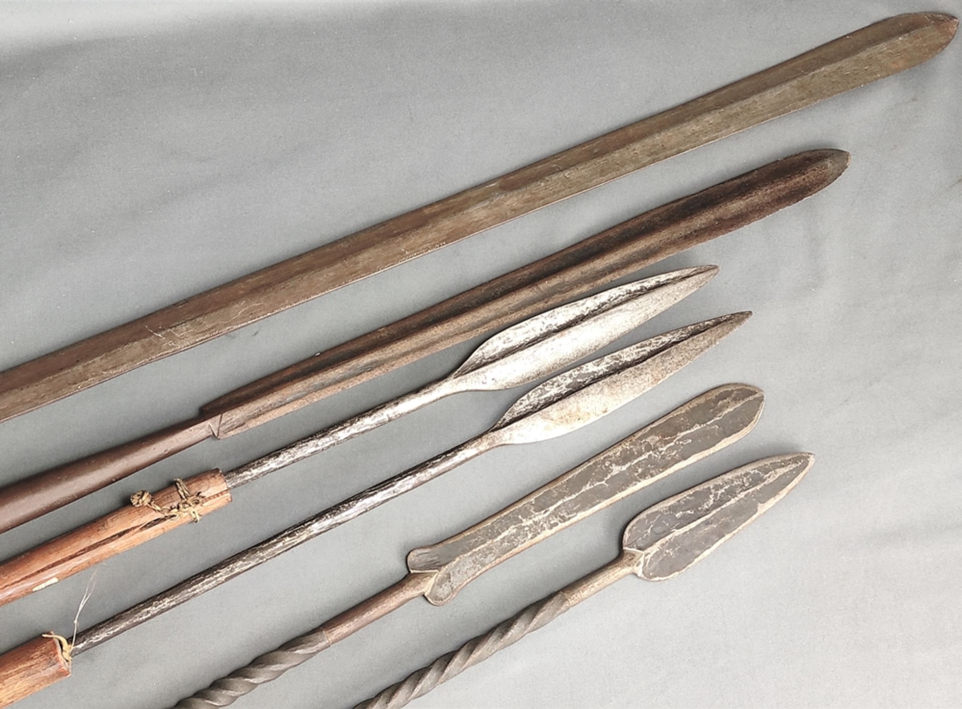 Convolute of five spears, and one spearhead, three with lancet-shaped blades and conical spouts, two