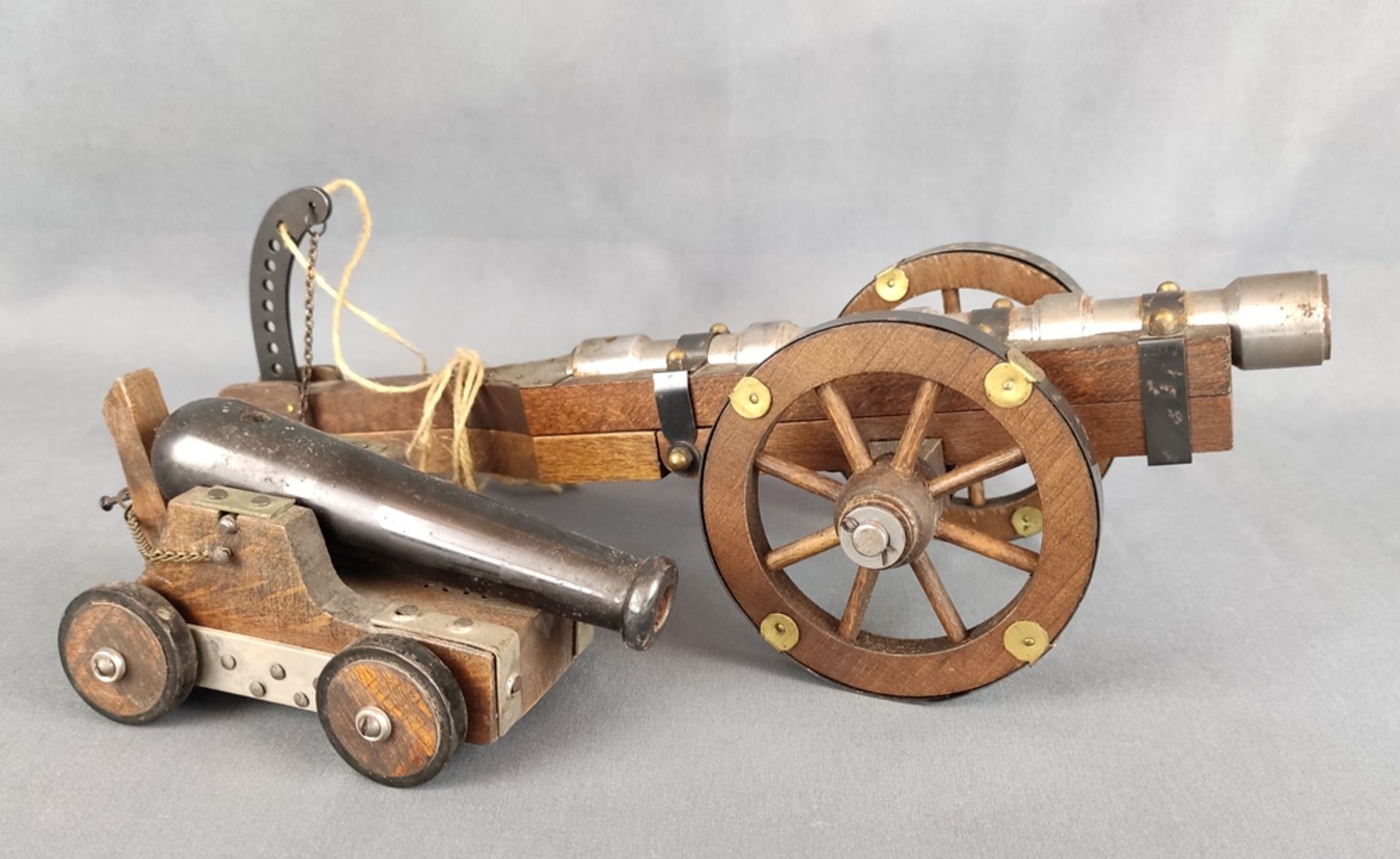 Two model cannons, iron cannon on wooden two-wheeled cart with brass fittings, cannon can be - Image 3 of 3