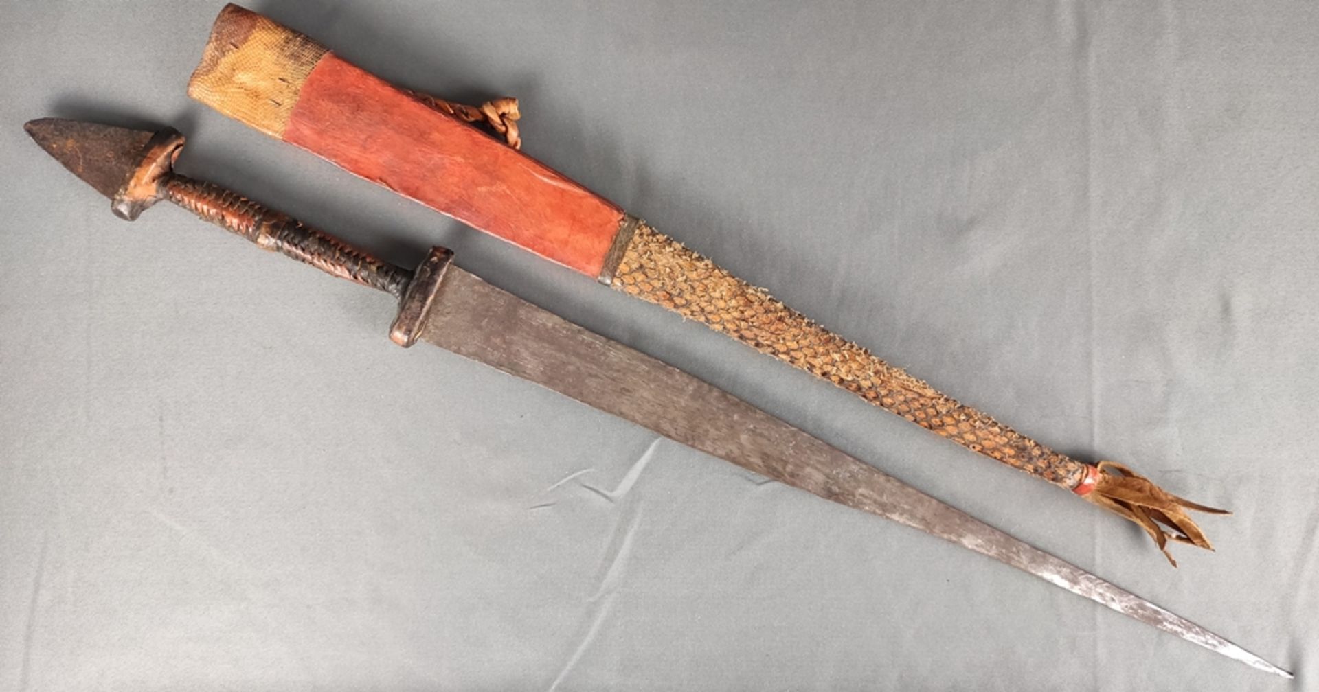 Thrusting weapon, in leather scabbard with snake, long narrow tapered blade, handle wrapped with - Image 3 of 4