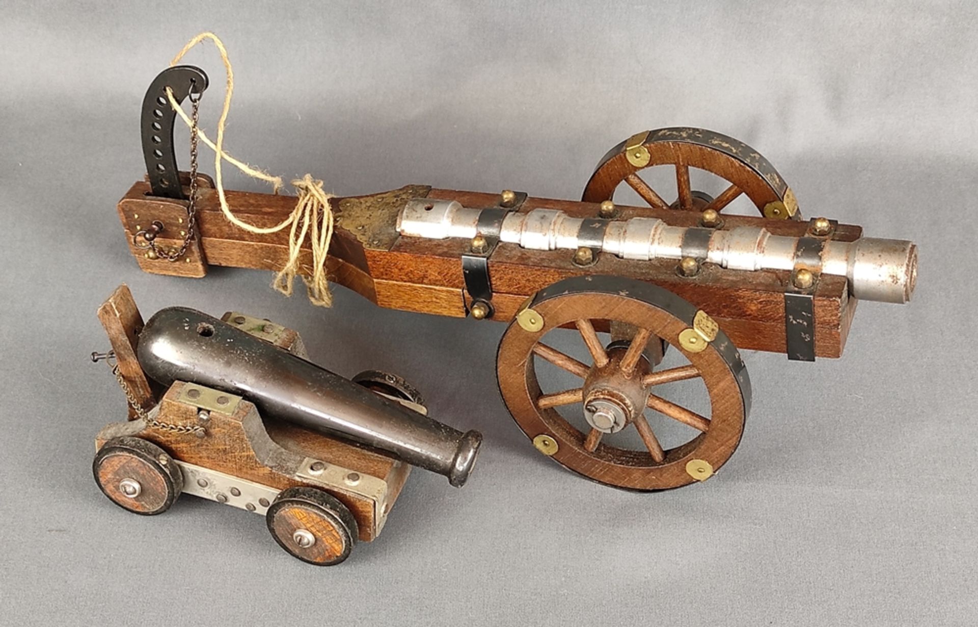 Two model cannons, iron cannon on wooden two-wheeled cart with brass fittings, cannon can be - Image 2 of 3