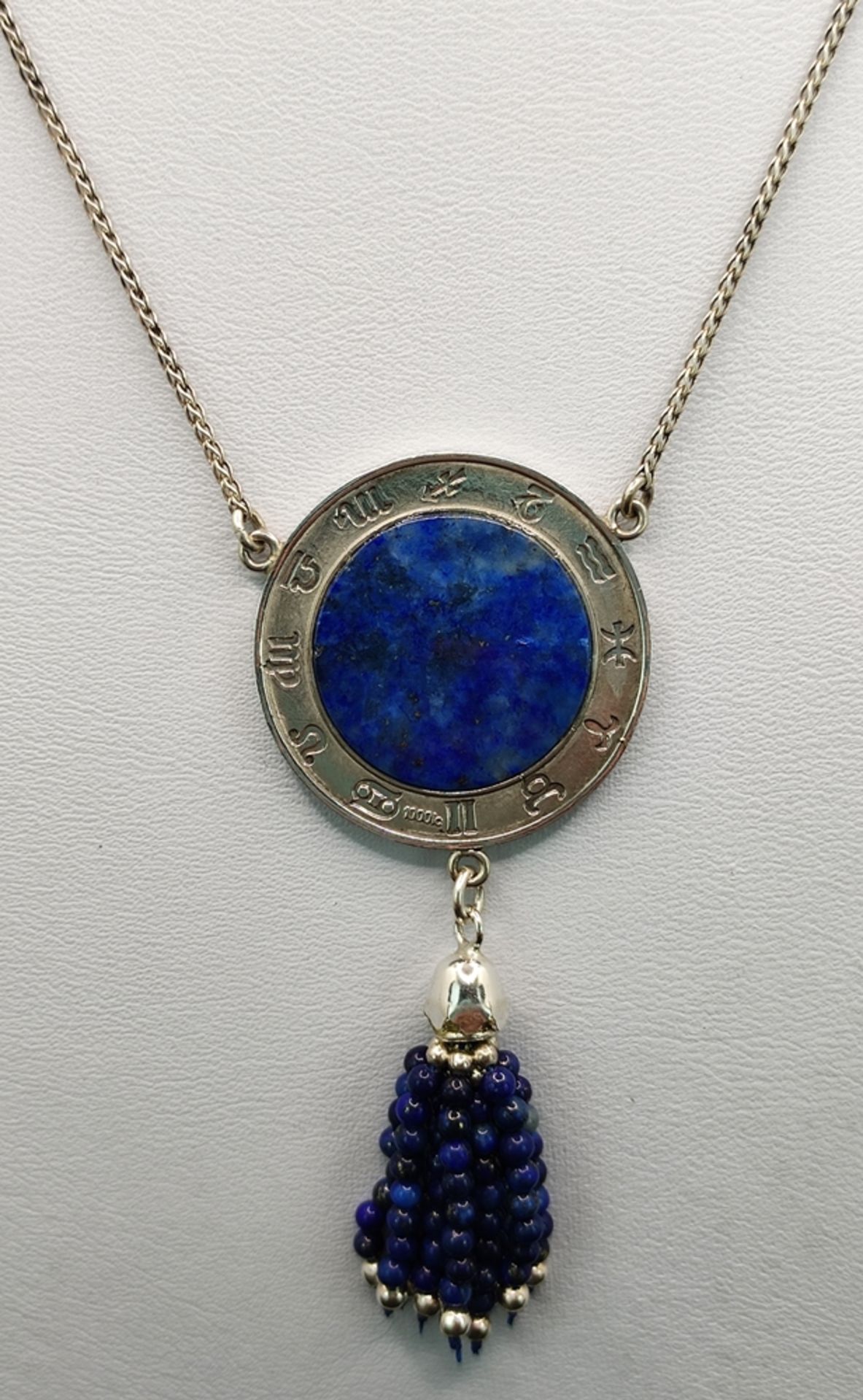 Designer lapis lazuli necklace, round central part set with a selected natural lapis lazuli plate,