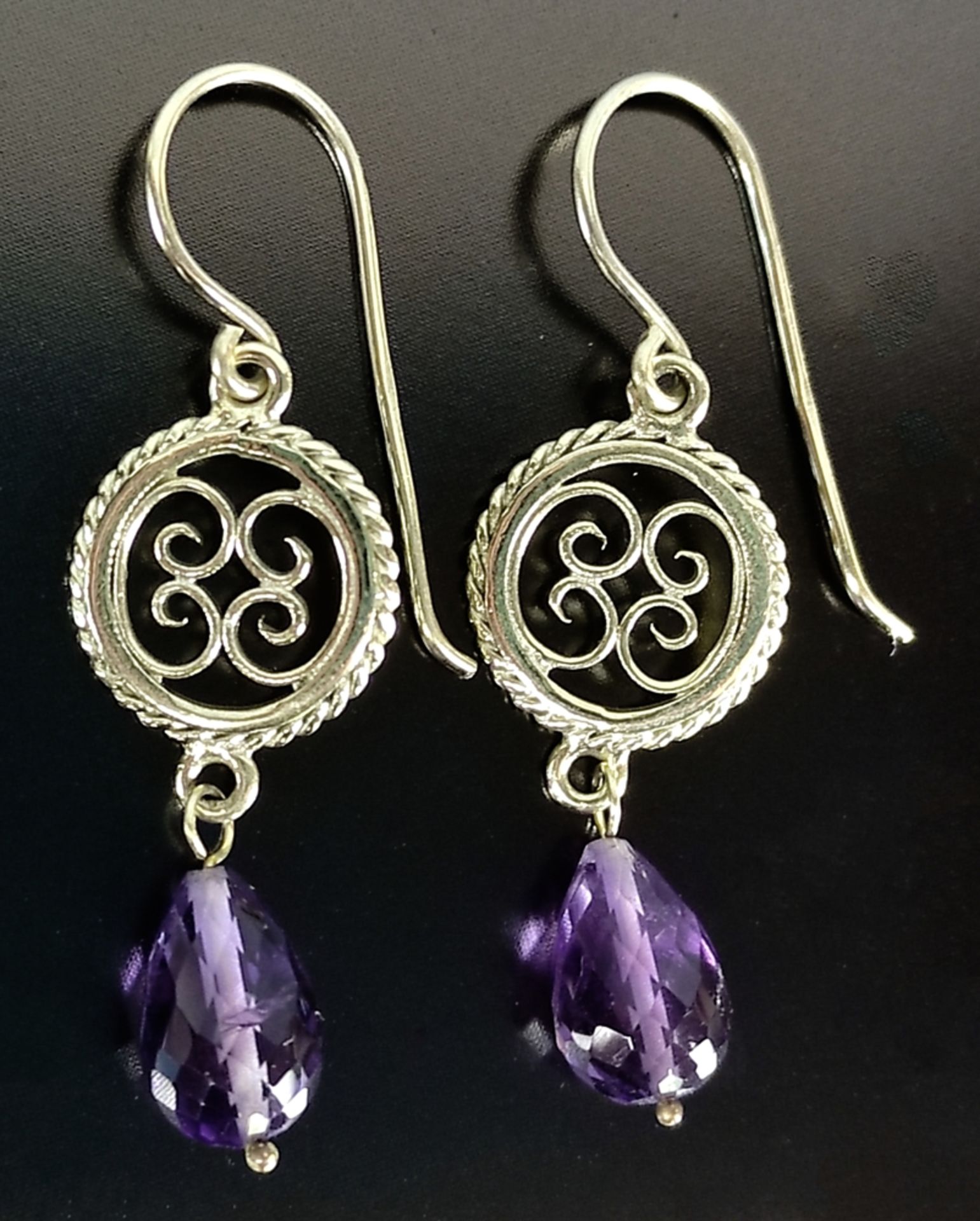 Antique gold earrings with amethyst, ear hooks with gold medallions in relief and suspended