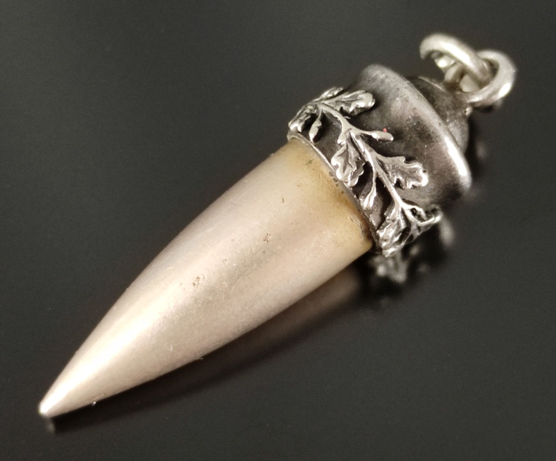 Pendant with bullet case, suspension decorated with oak leaves, length 3.5cm
