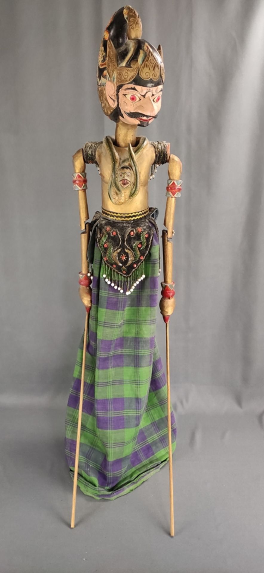 Large wayang golek doll, Indonesian stick doll, head, torso and arms carved, clothes elaborately