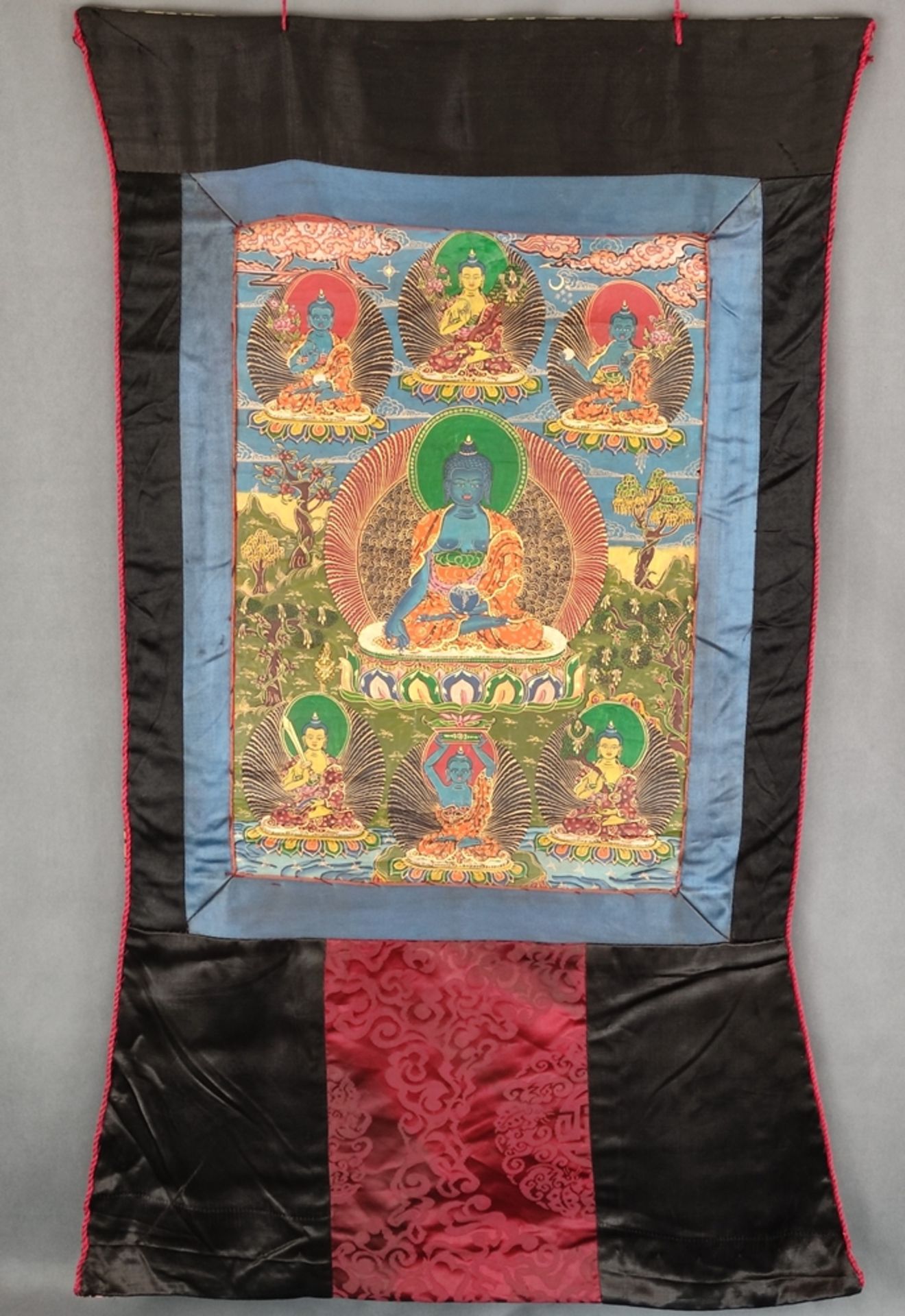 Thangka, with Bhai?ajyaguru (Medicine Buddha) in the centre, holding a bowl of healing elixir in his