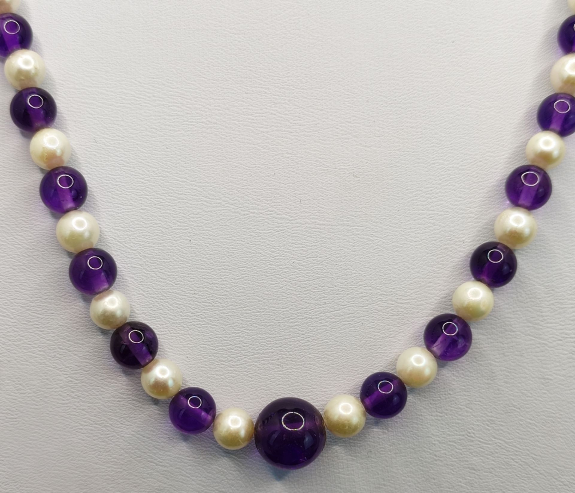 Amethyst-Akoya cultured pearl necklace, necklace made of finely polished natural amethyst spheres