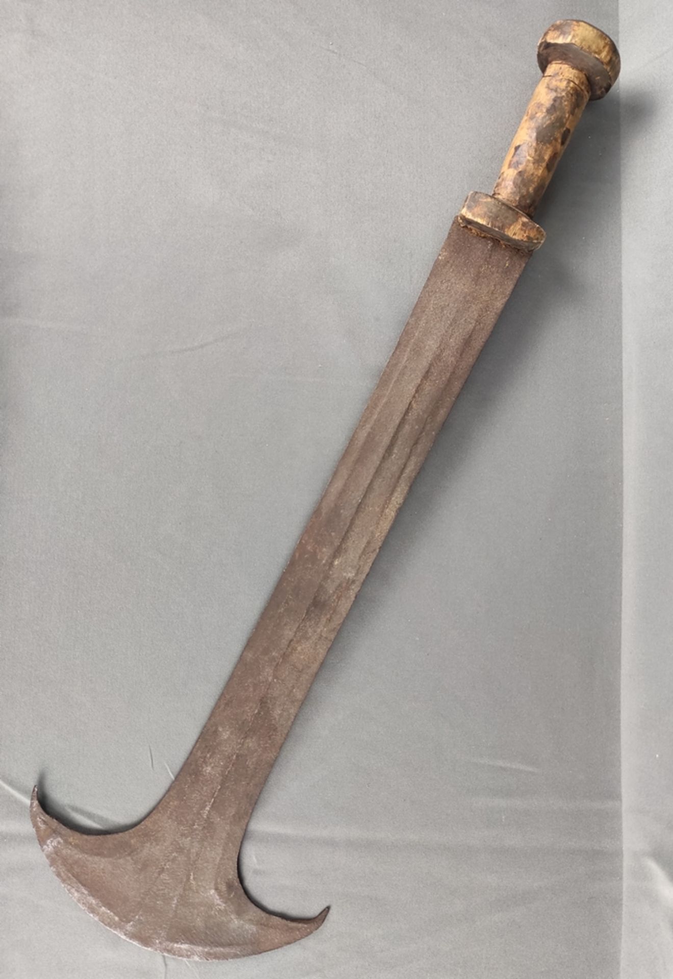 Konda sword, symmetrical sword with half-moon end, double-edged, wooden handle, probably used as