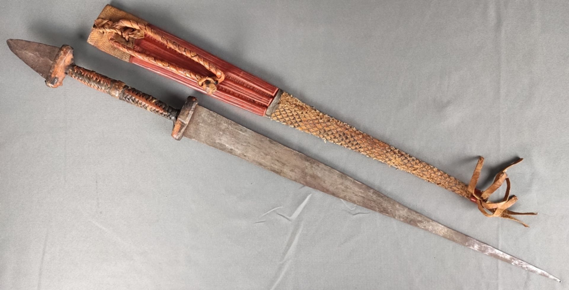Thrusting weapon, in leather scabbard with snake, long narrow tapered blade, handle wrapped with - Image 2 of 4