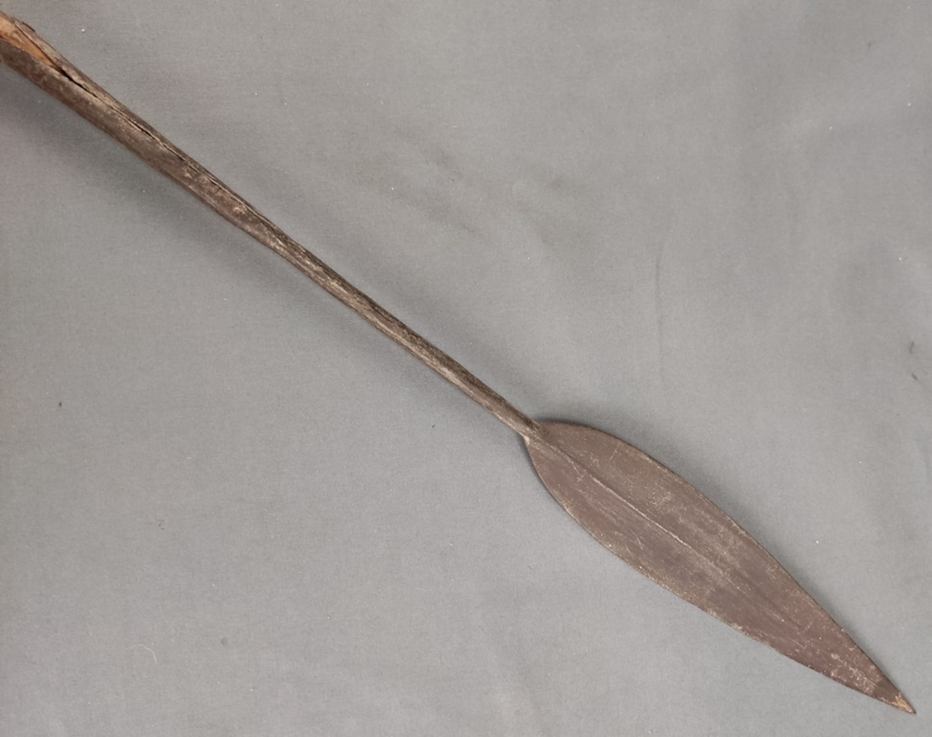 Spear with metal tip, middle part made of wood, lower part made of metal, decoration with hair,