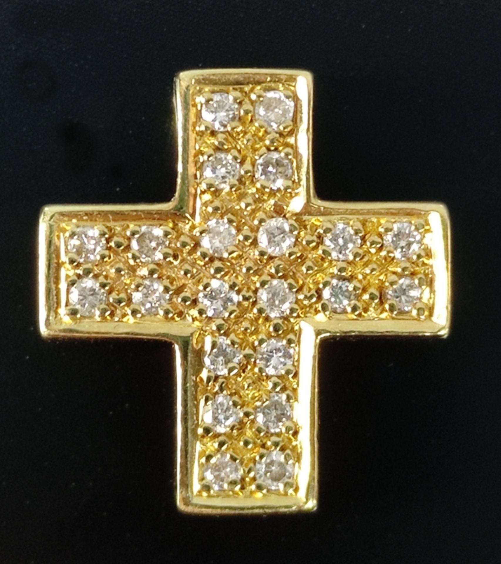 Kreuz-Anhänger mit 22 Brillanten, zusammen um ca. 0,22ct, 750/18K Gelbgold, 3,6g, 1,4x1,3cm