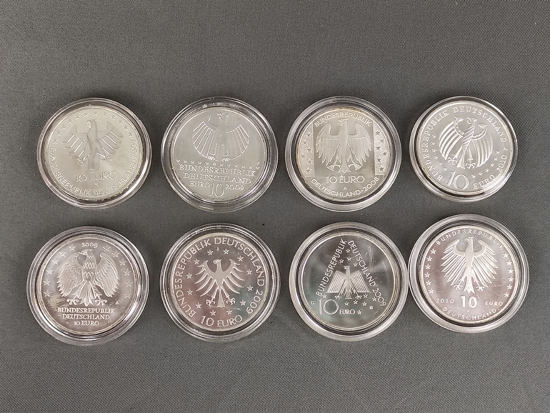 8 Silber-Münzen, Gedenkmünzen, je zu 10 Euro, Sterlingsilber, bestehend aus: 100 Jahre Luftfahrt, 2