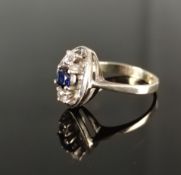 Sapphire ring, two cubic zirconia and center sapphire around 0.4ct, 333/8K white gold, 2.7g, ring s