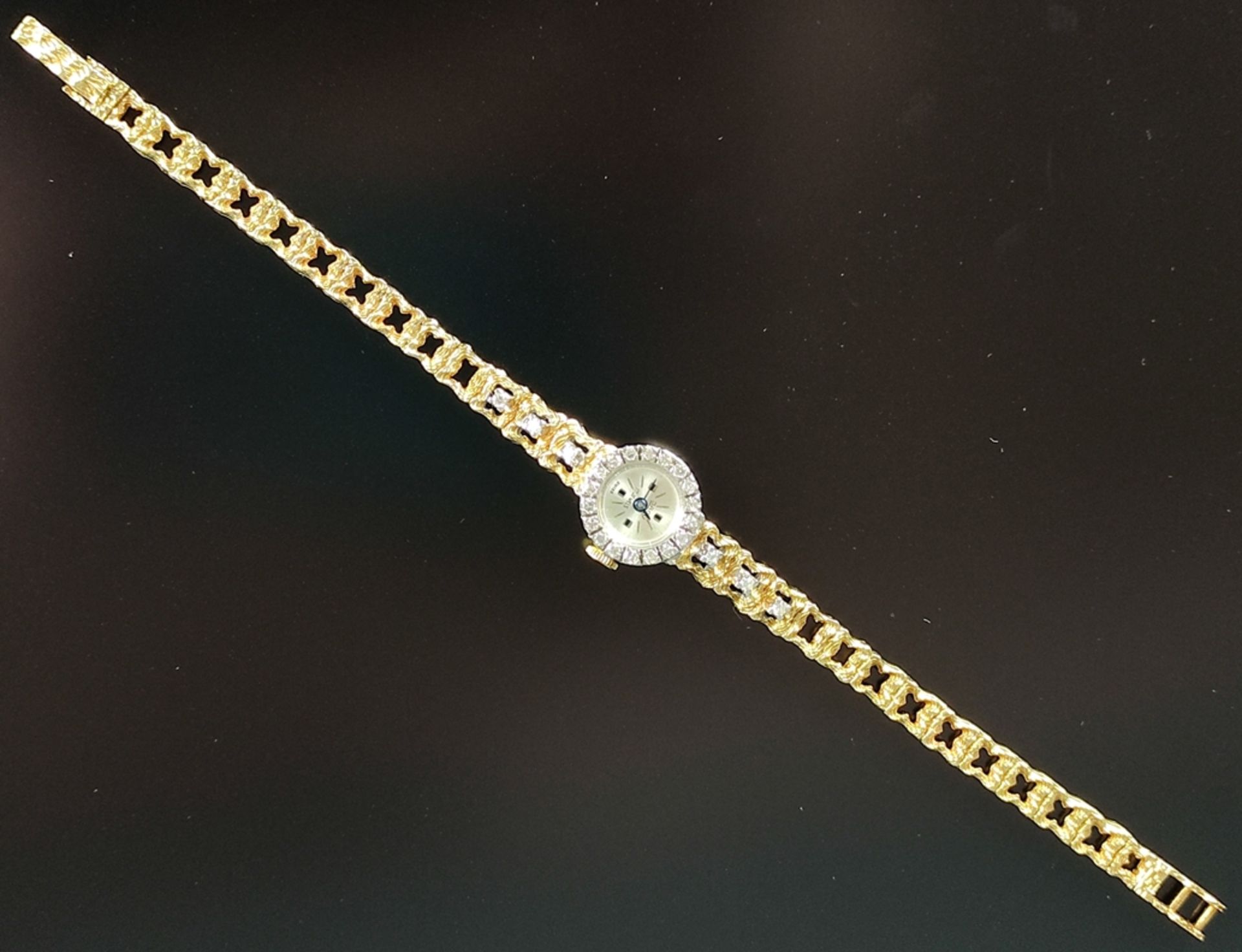 Armbanduhr, Jagu, rundes Ziffernblatt, Rand besetzt mit 18 Brillanten, Durchmesser 1,5cm, durchbroc - Bild 4 aus 4