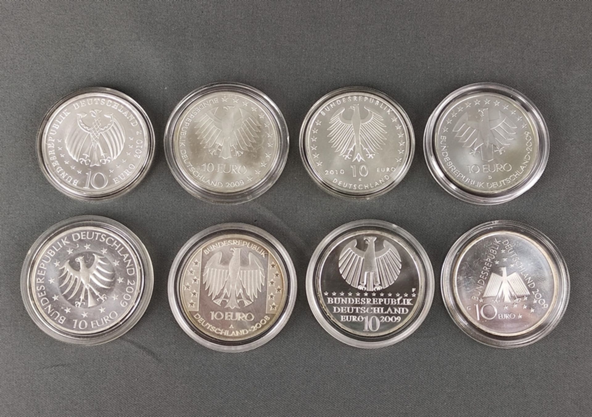 8 Silber-Münzen, Gedenkmünzen, je zu 10 Euro, Sterlingsilber, bestehend aus: 100 Jahre Luftfahrt, 2