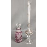 Zwei Glasobjekte, eine schlanke Vase mit silbernen Blütenapplikationen, Kristallglas, Höhe 30cm und