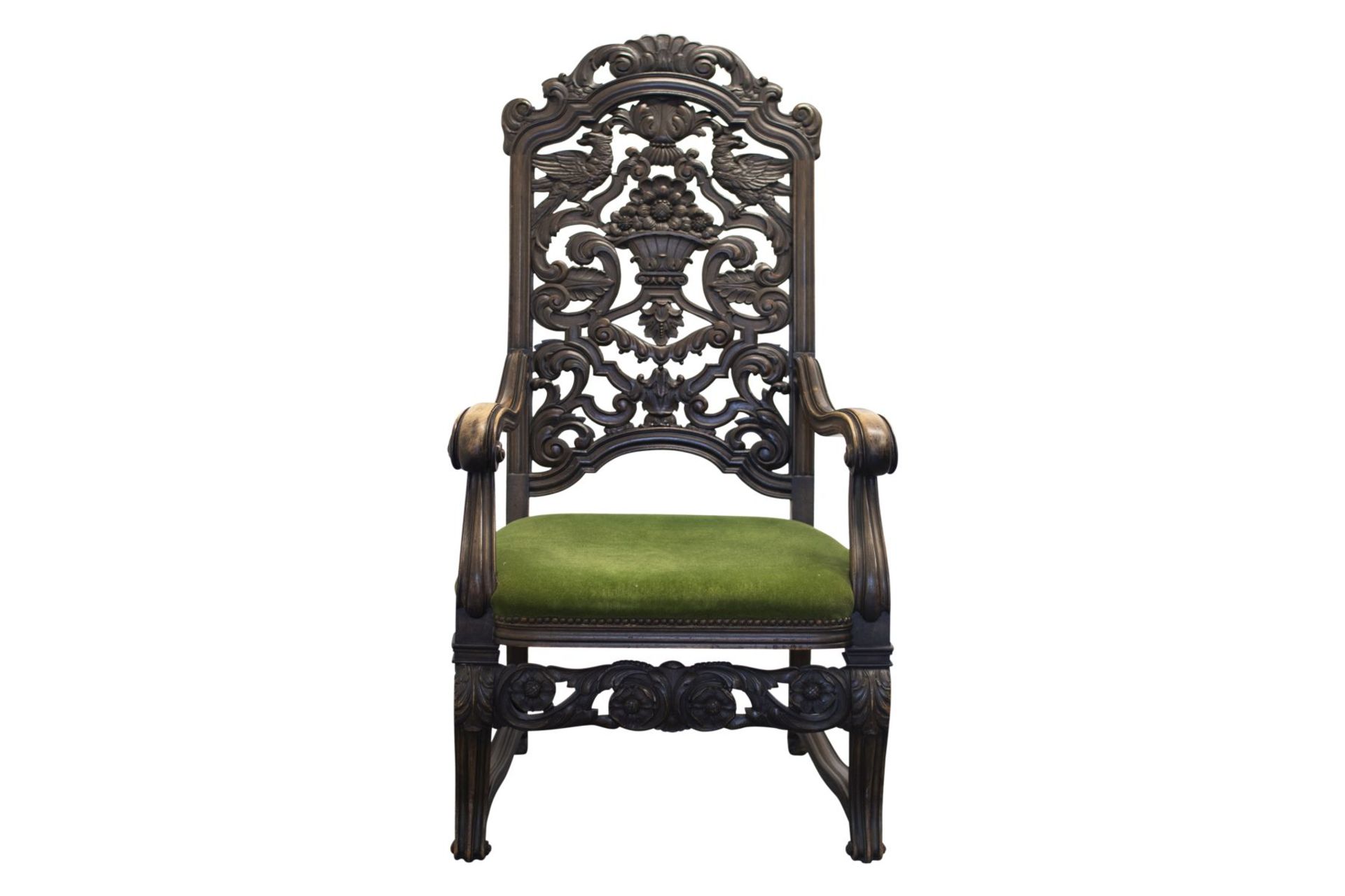 Armchair with carved backrest