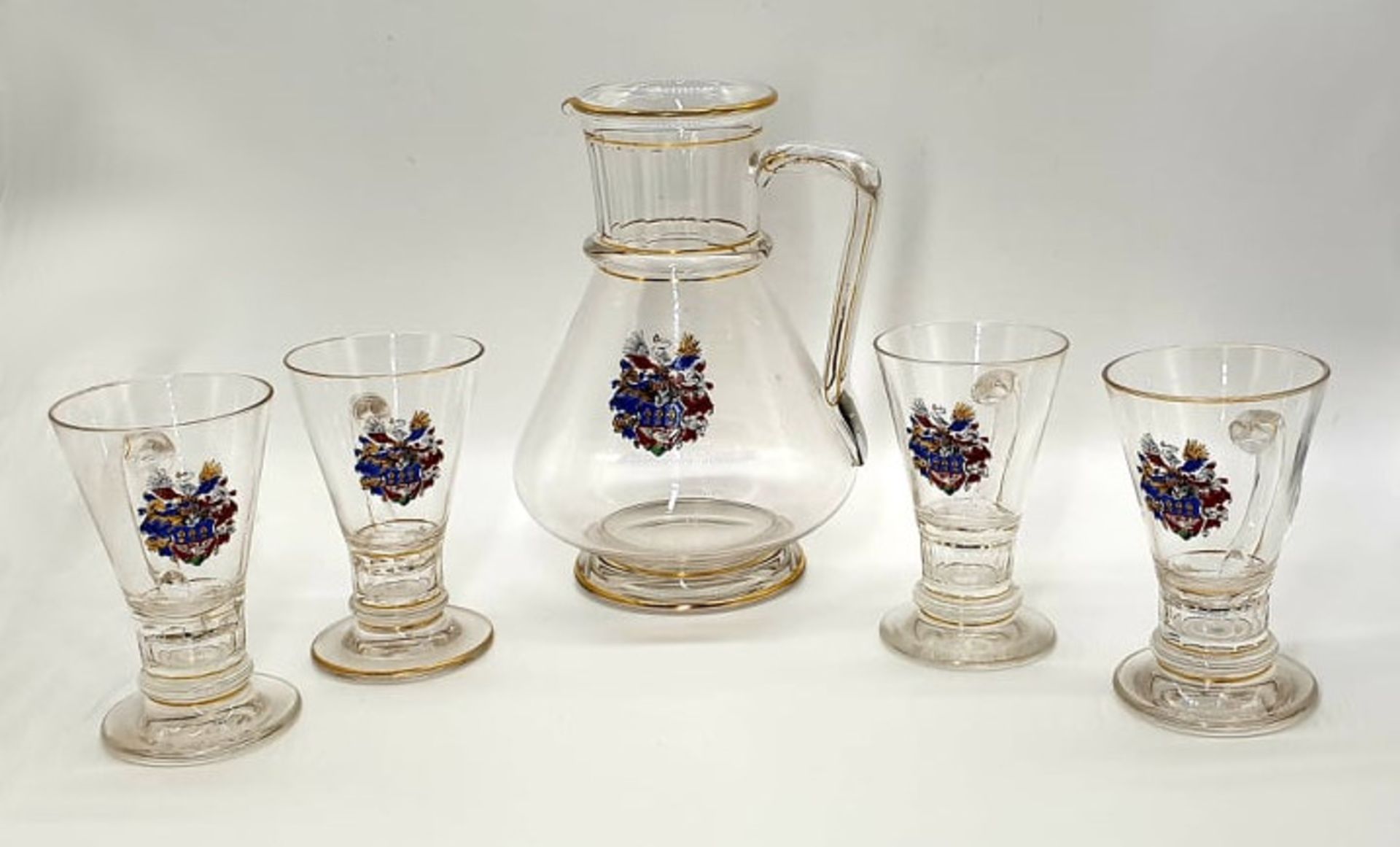 Late 19th century 5 piece set, Lobmeyr, Austria. A caraffe and 4 glasses with handles, each piece