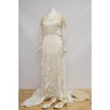 An original 1930s Silk & Lace Wedding Dress, shoes, headwear, ornate silk stockings, all wrapped