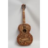 A Wooden Guitar by famous sculptor and artist Maxie Lane. The item remains in great condition, and