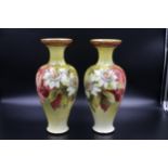 A beautiful pair of Royal Doulton vases in excellent condition as photographed.