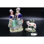 A pair of 19th Century Royal Staffordshire figurines, 1 x Ram and 1 x Scottish Flatback, both